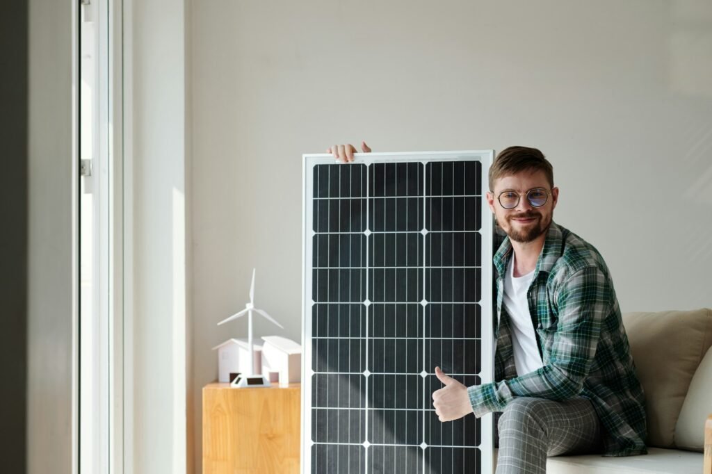 happy Man with Solar Panel